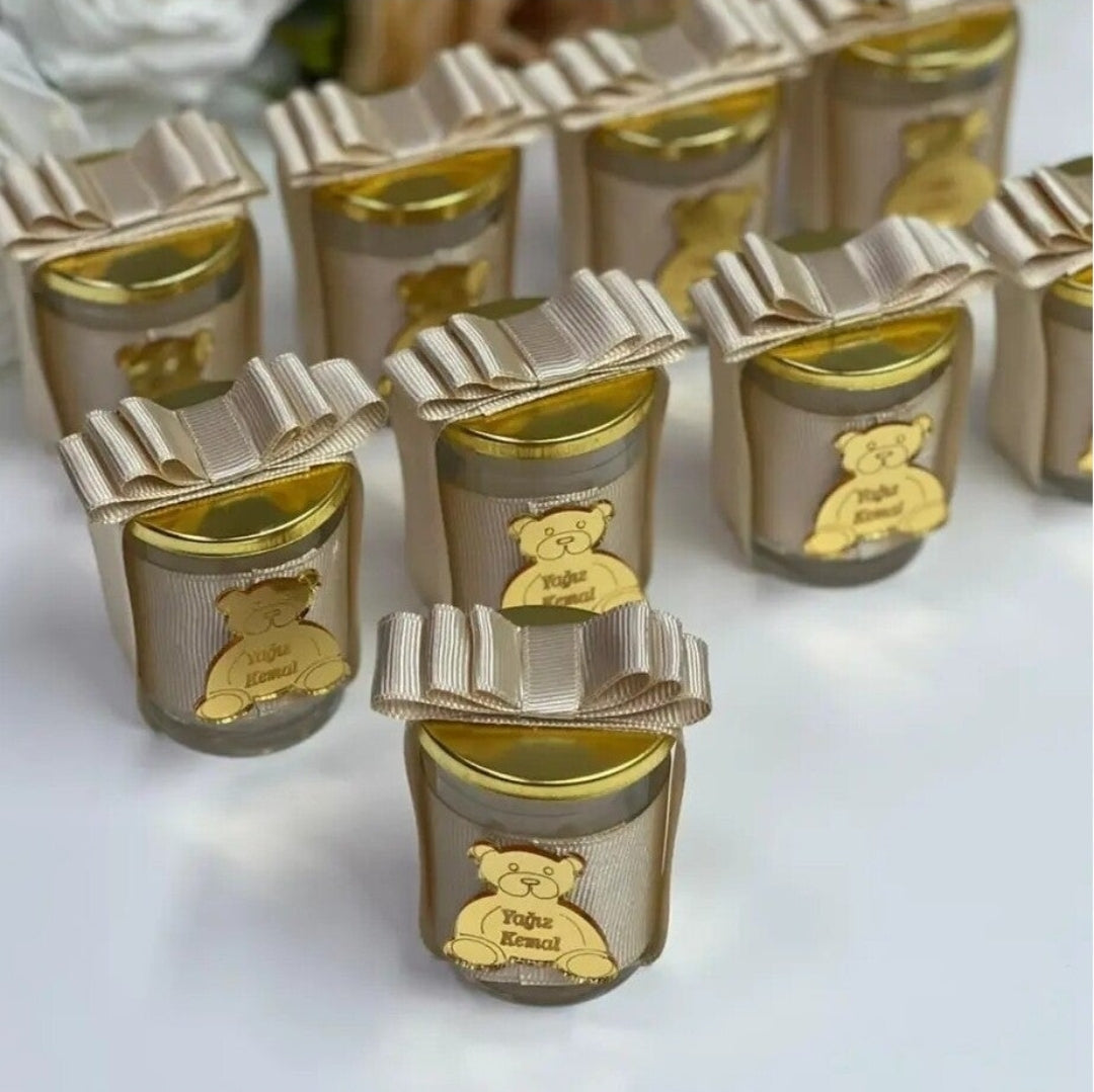 Vela elegante en recipiente de vidrio